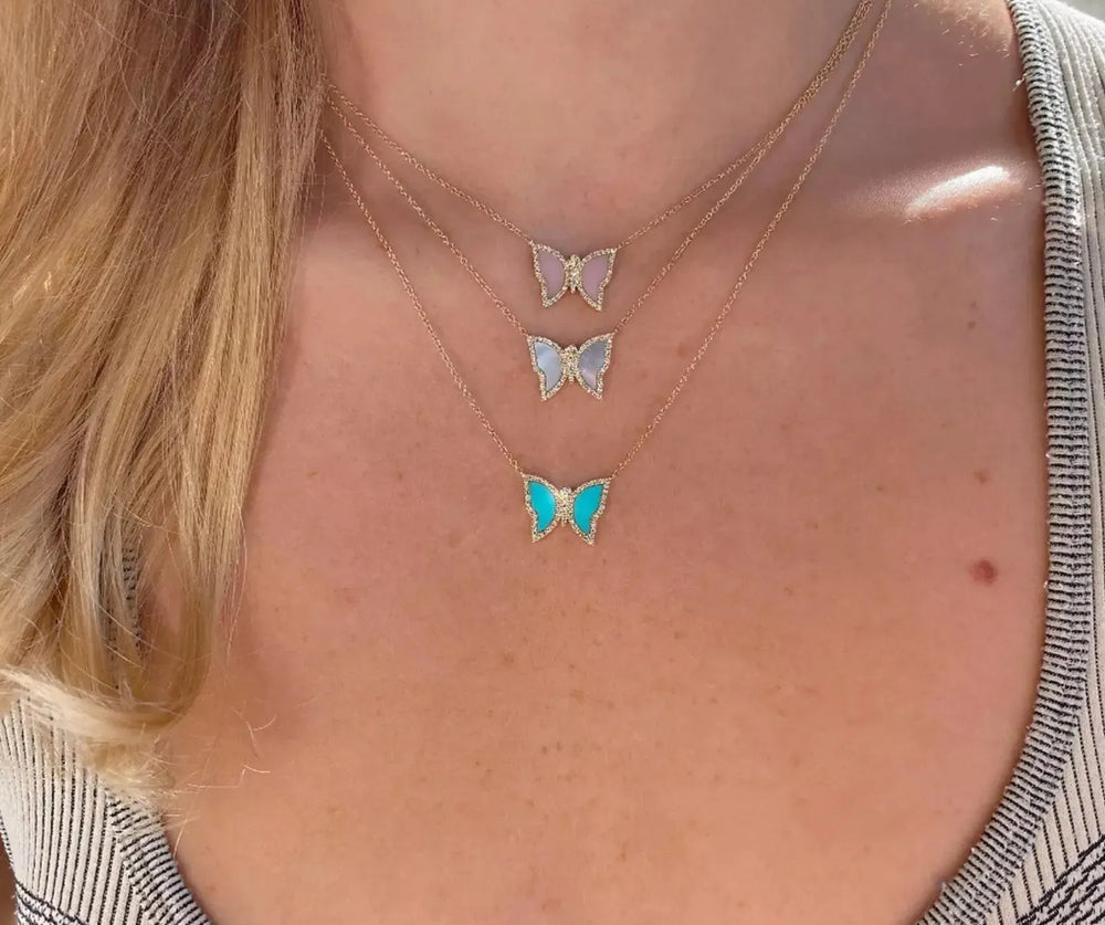 
            
                Load image into Gallery viewer, Turquoise Butterfly Necklace
            
        