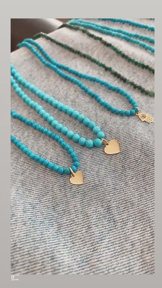 
            
                Load and play video in Gallery viewer, Gold Heart Turquoise Necklace
            
        